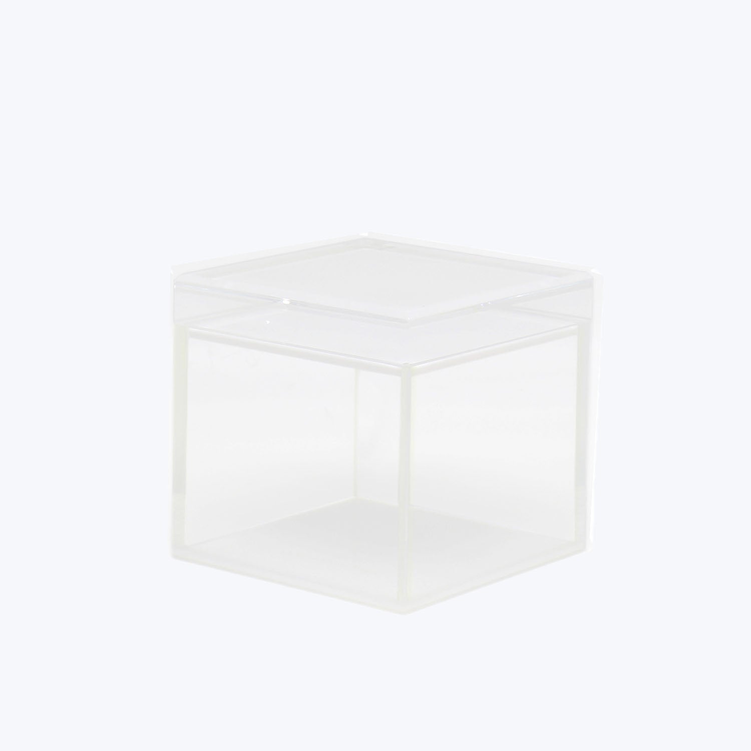 Minimalist clear acrylic box with lid on a white background.