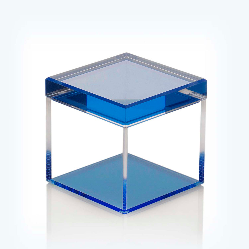 Transparent blue trophy-like object with stepped design on white background.