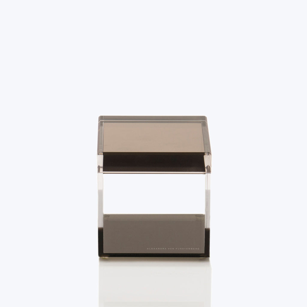 Modern acrylic box with metallic top, branded Alexandra Von Furstenberg.