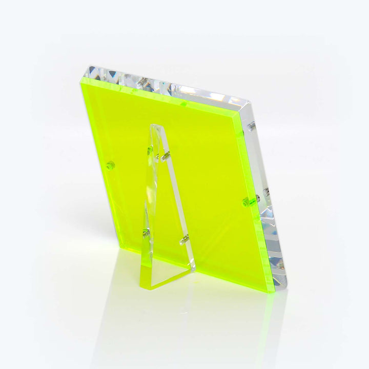 Neon yellow-green acrylic award with beveled edges and transparent stand.
