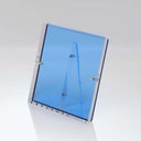 Transparent blue acrylic display stand showcasing a menu or sign.