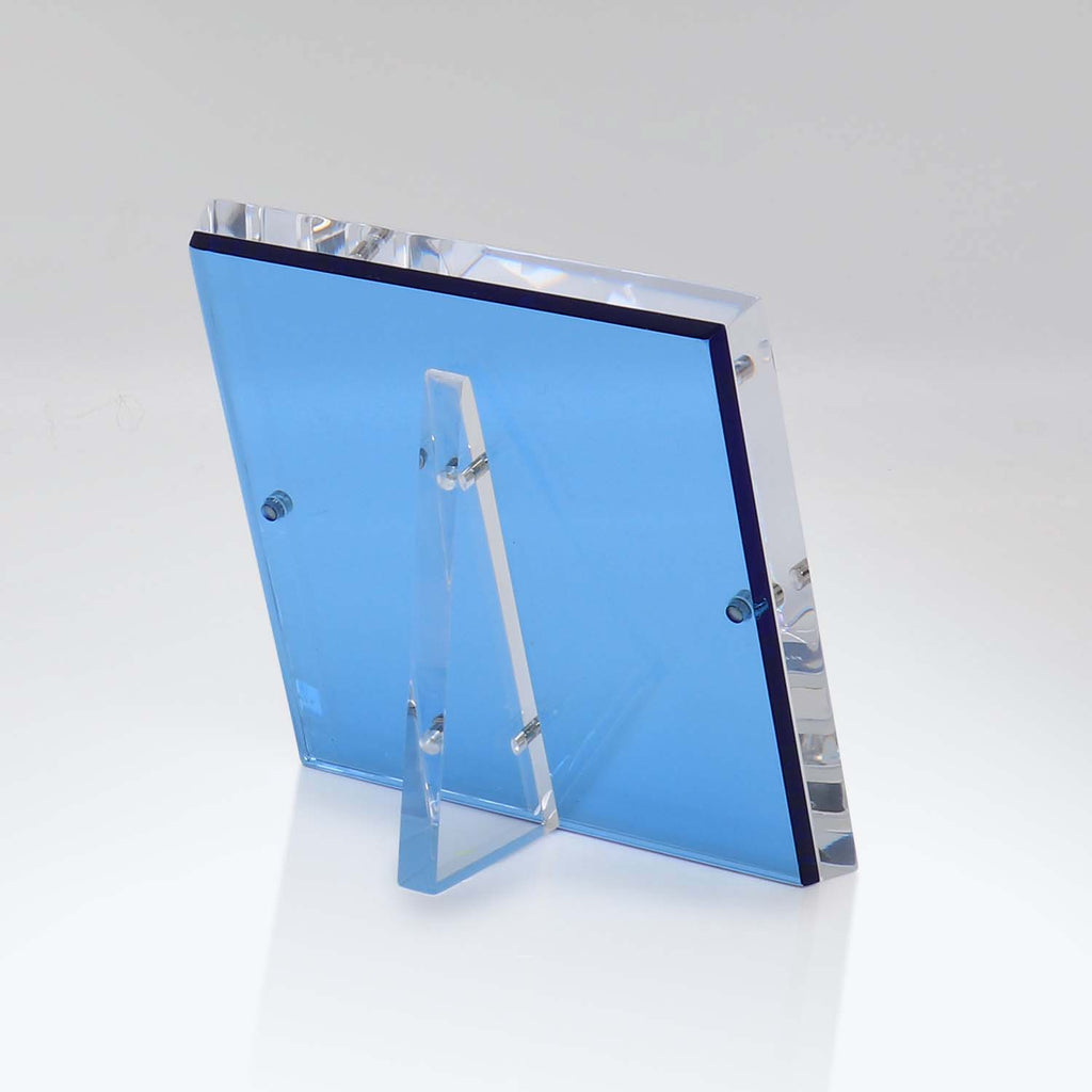 Modern acrylic award with translucent blue panel and elegant design.