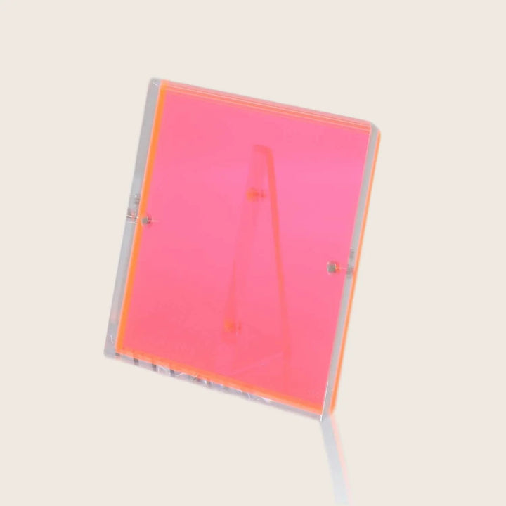 Neon pink acrylic display stand with translucent nodes and hinges.