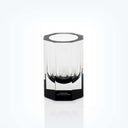 Translucent cylindrical vase with reflective edges by Alexandra Von Furstenberg.
