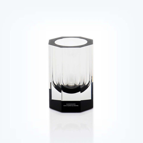 Translucent cylindrical vase with reflective edges by Alexandra Von Furstenberg.