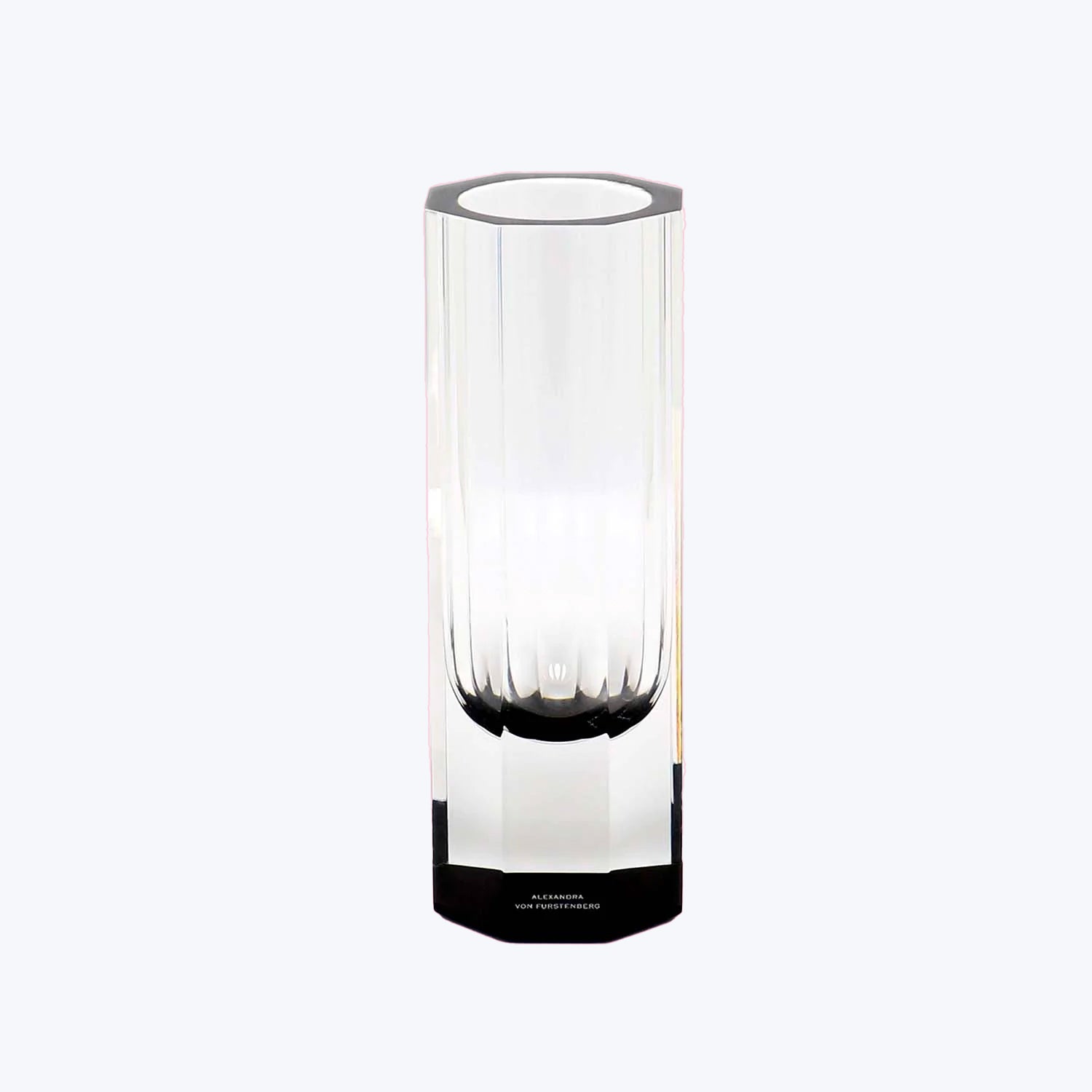 Modern, minimalist designer vase with transparent body and textured ridges.