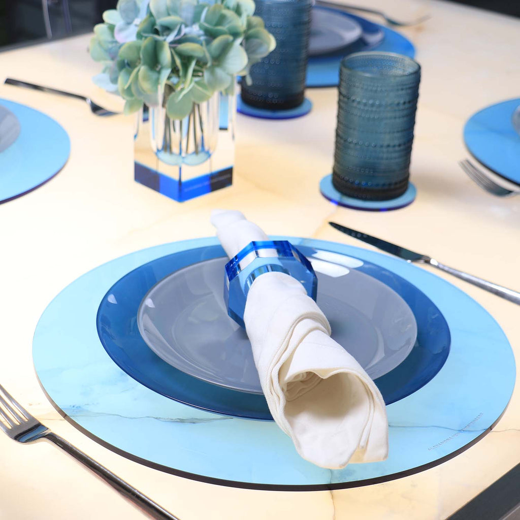 Elegant blue and white table setting with decorative centerpiece