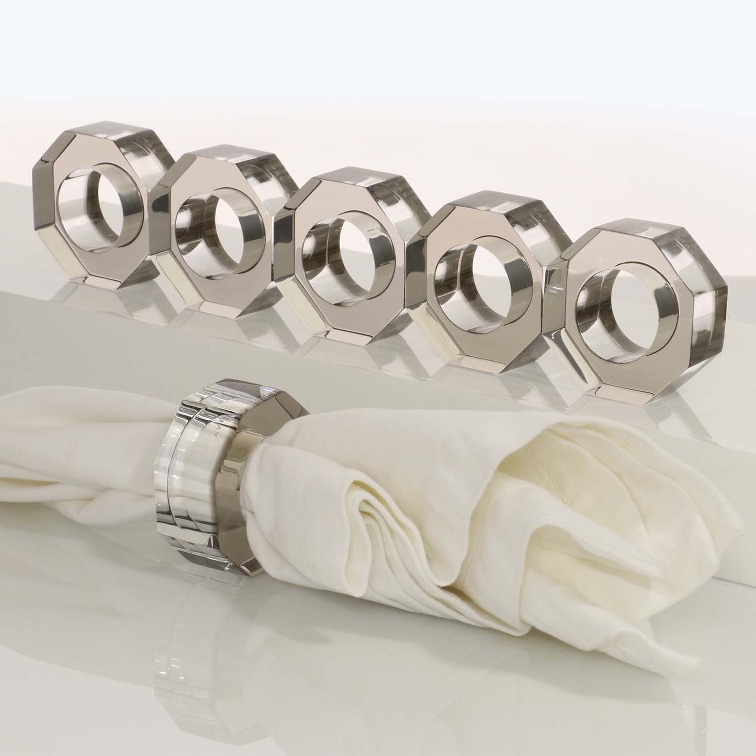 Set of six sleek metallic napkin rings adding elegance