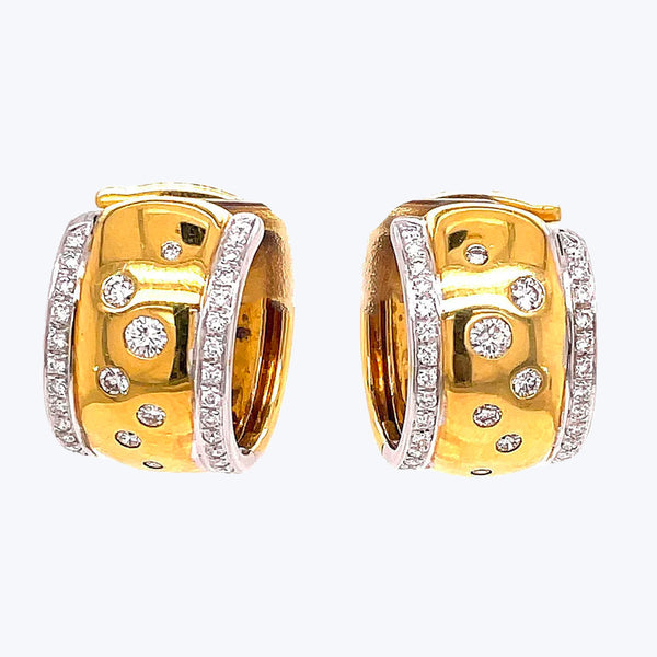 Elegant and versatile gold hoop earrings with diamond accents.