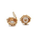 Gold-toned earrings with intricate nest design and bird's nest detailing.