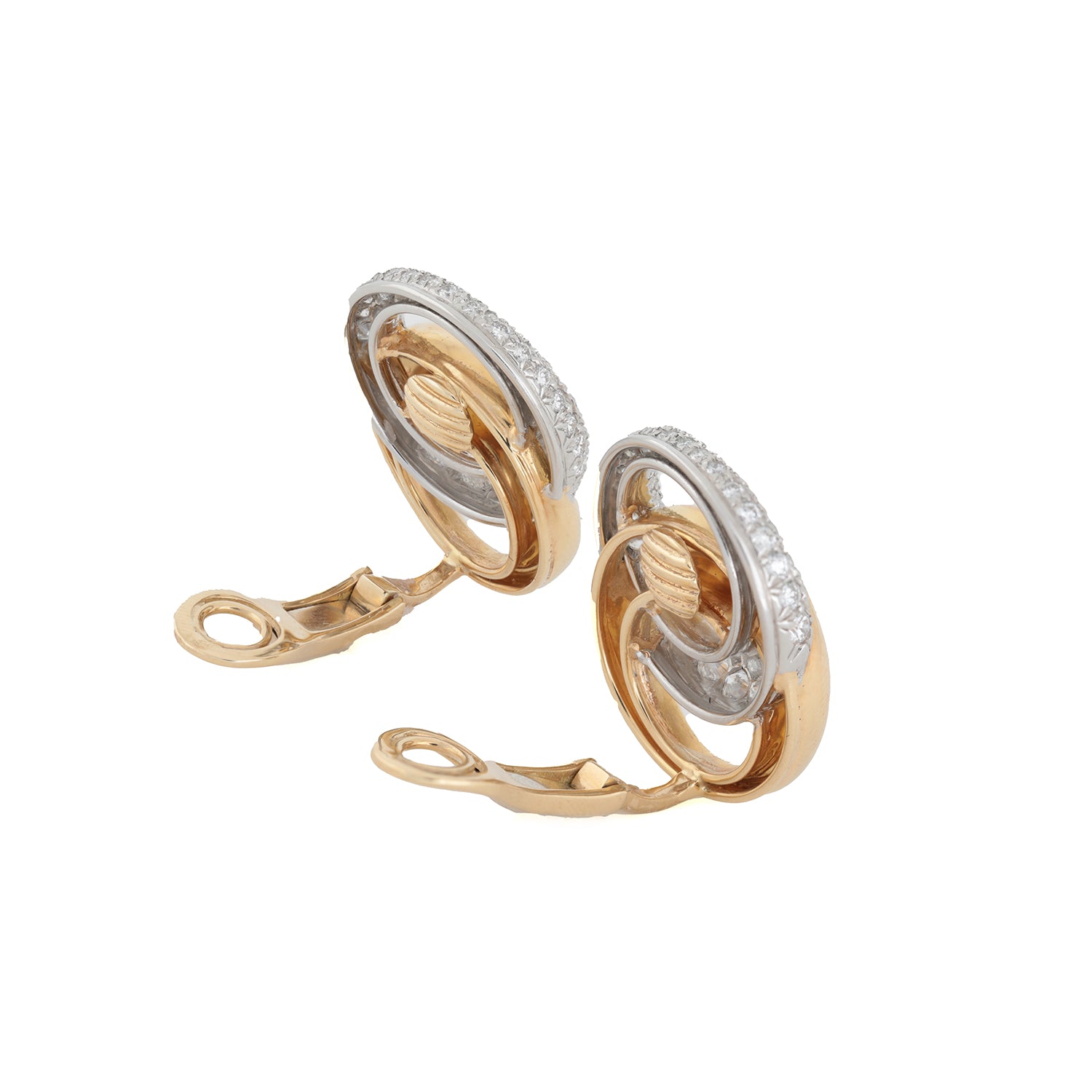 Exquisite gold-tone earrings with diamond-like accents showcase elegance and craftsmanship.