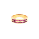 Gold ring with channel-set pink stones for an elegant touch.