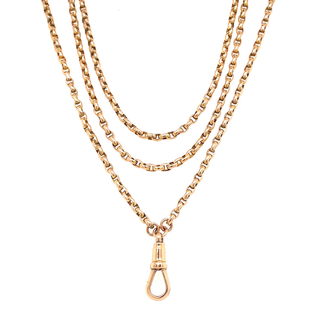 Gold chain with lobster clasp, showcasing durability and secure design.