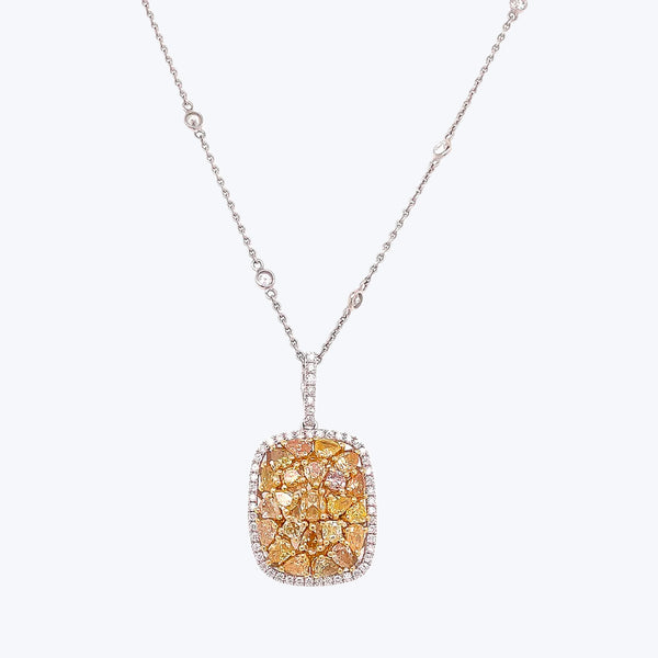 Exquisite pendant necklace with sparkling clear stones and vivid gemstones.