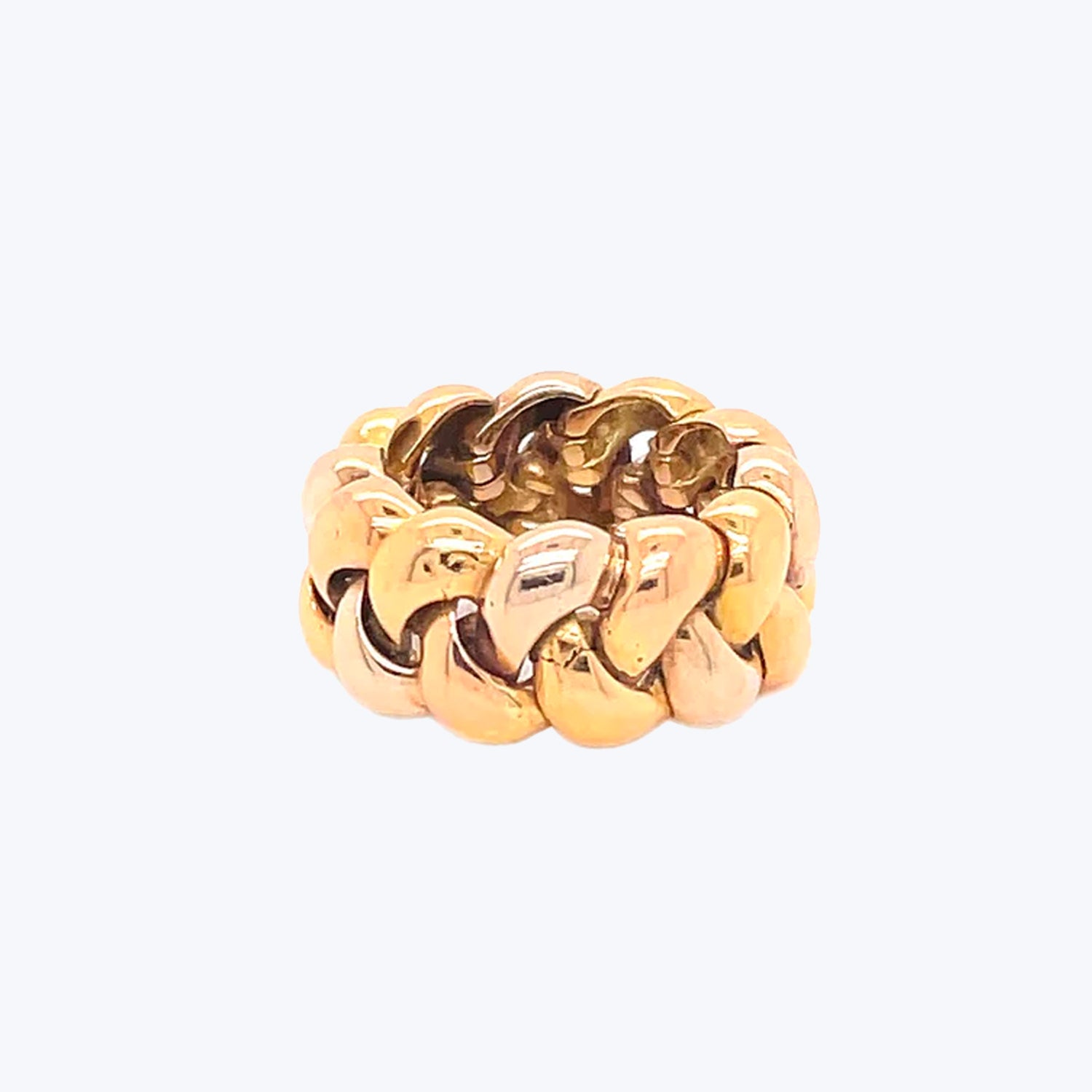 Gold ring with chunky, textured design and interlocking rounded links.