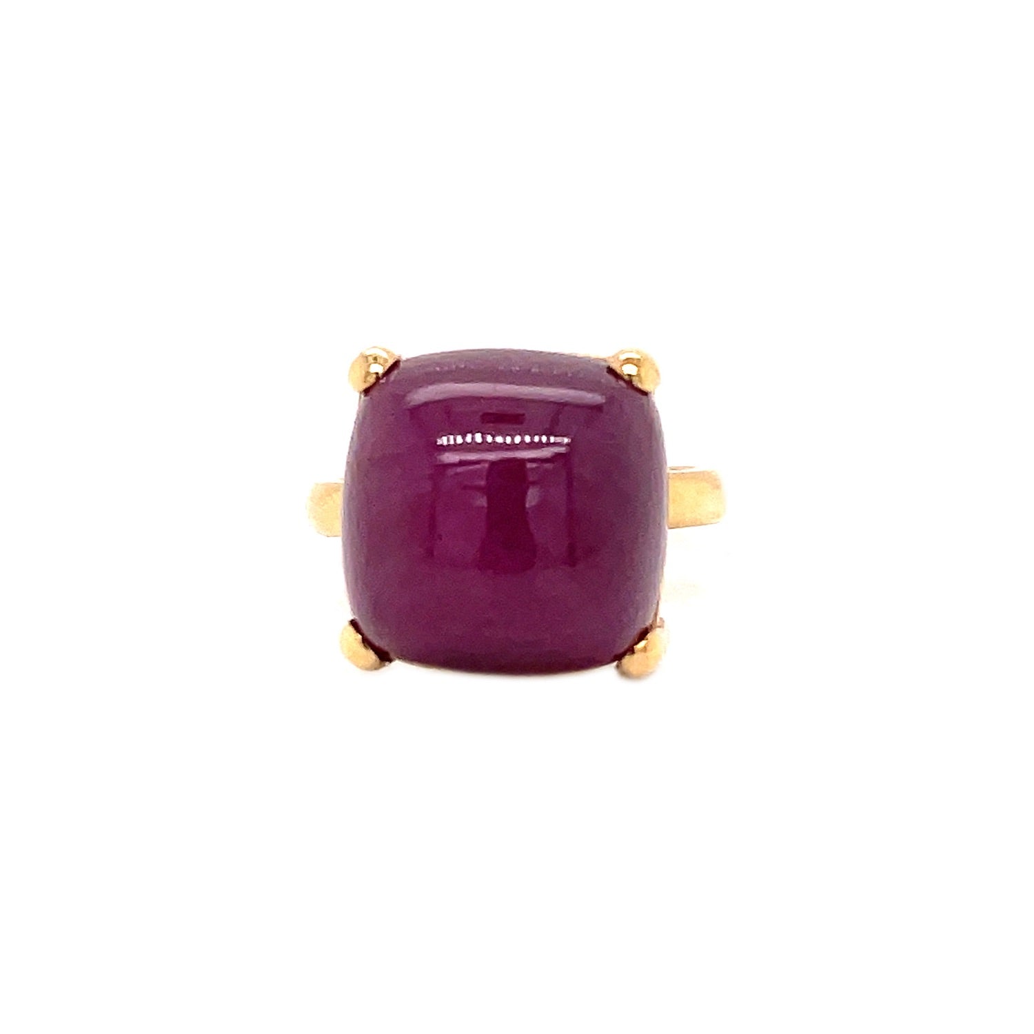 Elegant gold ring with cushion-cut purple gemstone, perfect for occasions.