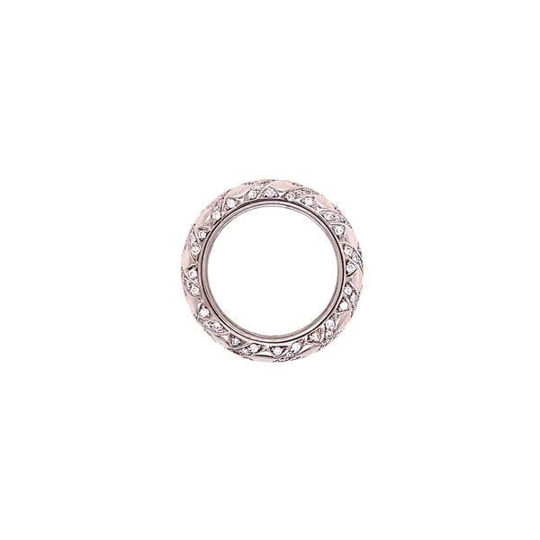 Exquisite rose gold ring with intricate gemstone details on band