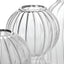 Close-up view of ribbed glass vases in high key lighting