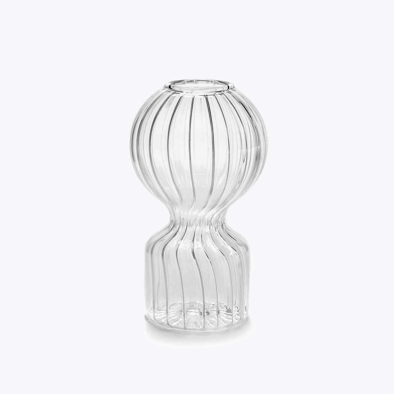 Clear glass vase with unique ribbed design on white background