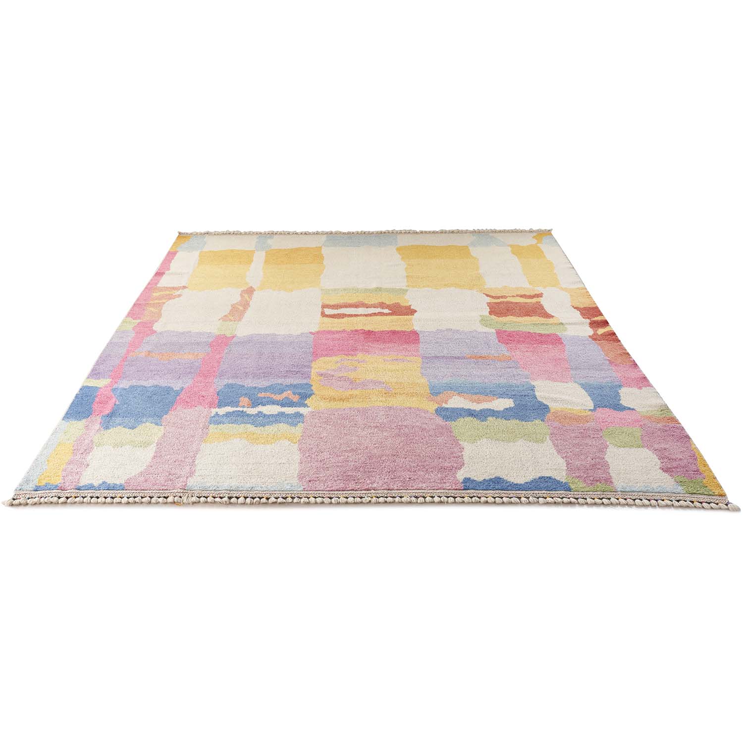 Vibrant and playful rectangular area rug with abstract patchwork design.