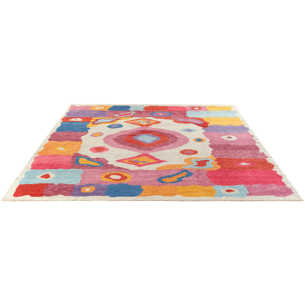 Vibrant and eclectic rug with abstract patterns and bold colors.