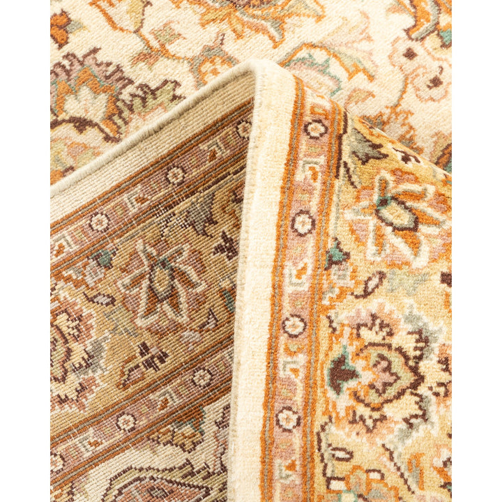 Intricate and vibrant traditional rug showcasing exquisite craftsmanship and design.