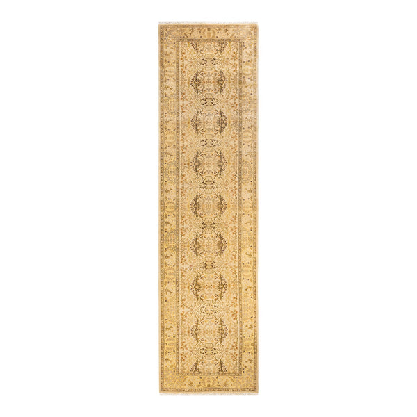 Elegant, antique-style rug with intricate symmetrical pattern and golden accents