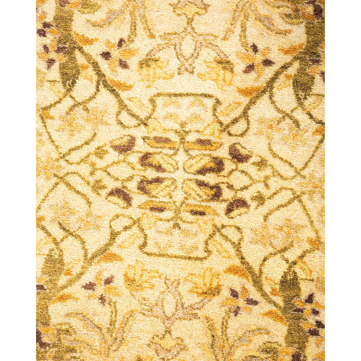 Intricate, symmetrical rug pattern with ornate floral and vegetal motifs.