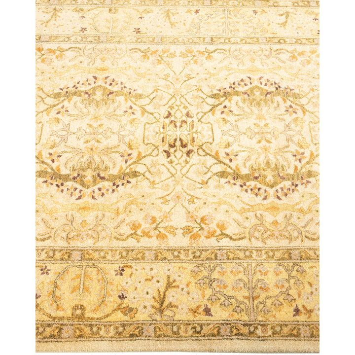 Ornate and sophisticated rug with intricate floral motifs and symmetrical design.