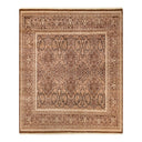 Traditional-style area rug with intricate pattern in earthy tones.