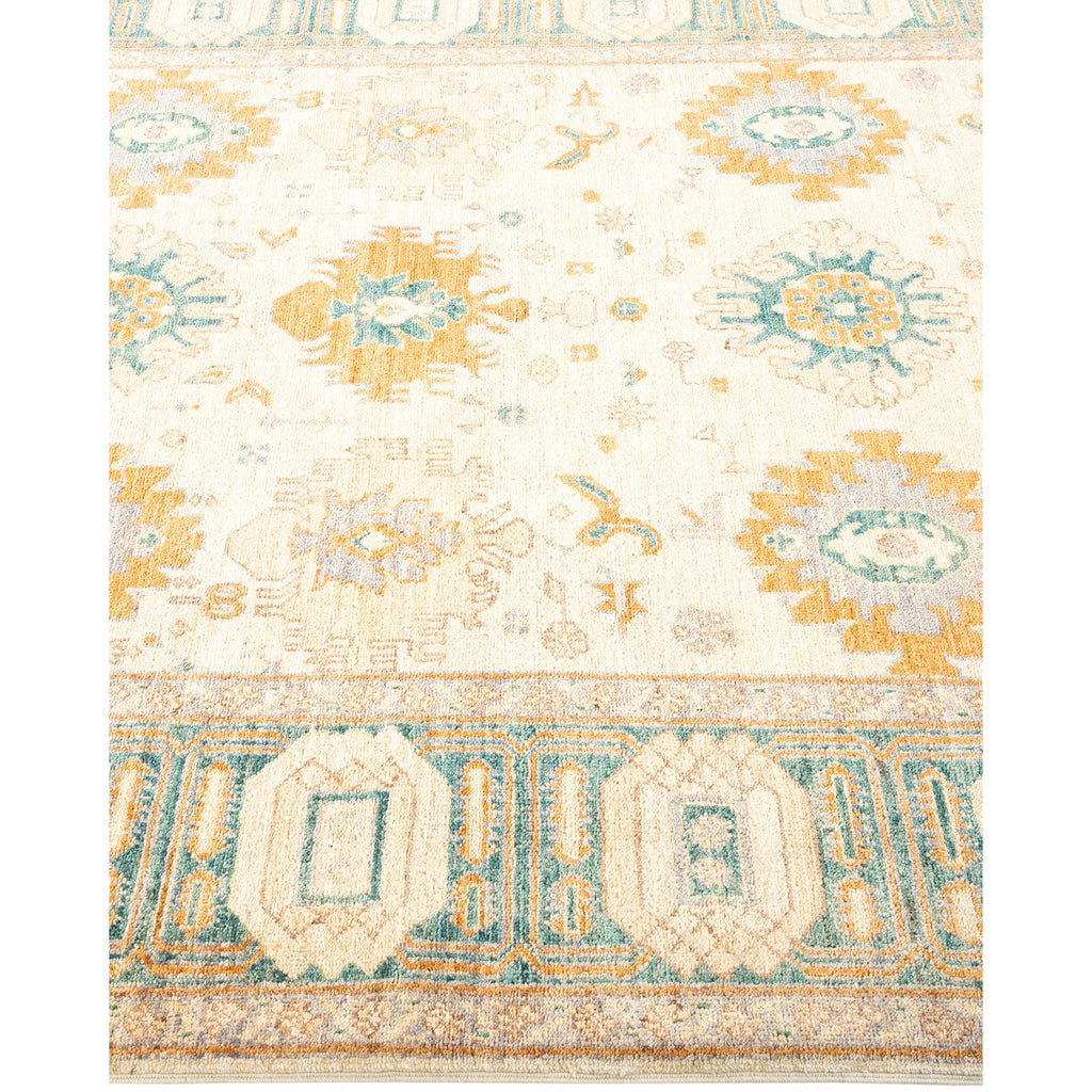 Intricate vintage-inspired decorative rug showcases traditional motifs in blue and orange.