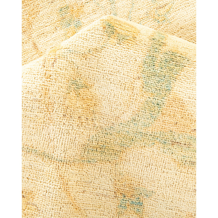 Close-up of plush, textured fabric showcasing speckled beige and green.