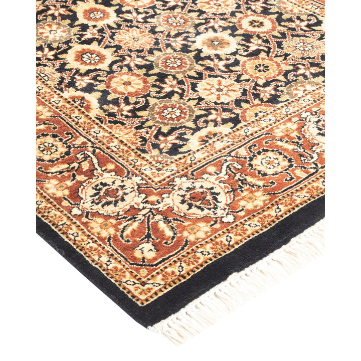 Exquisite handwoven rug with intricate patterns in warm orange hues