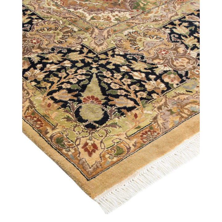 Elaborate corner section of handcrafted rug with floral motifs