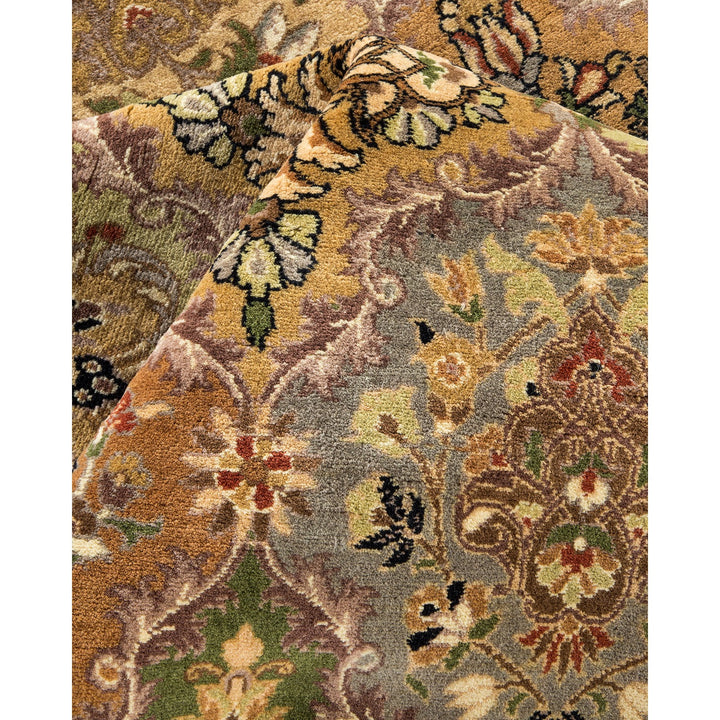 Close-up of a high-quality, intricately designed patterned carpet in various colors.
