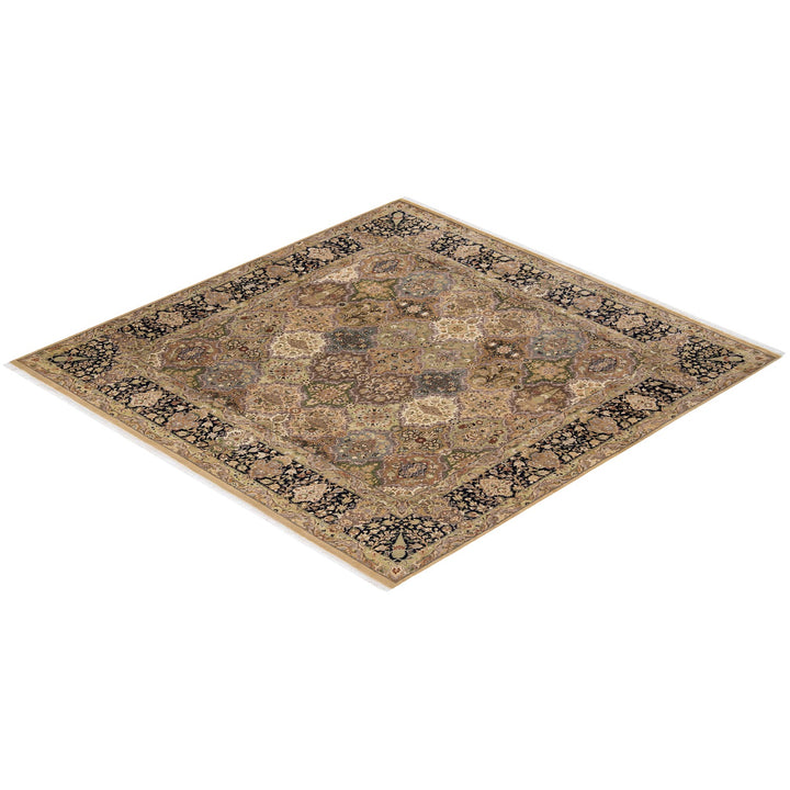 Intricate Persian-style area rug with ornate floral motifs on display