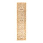 Exquisite beige rug adorned with intricate floral and geometric motifs.