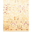 Intricately patterned traditional-style area rug in cream and beige hues.