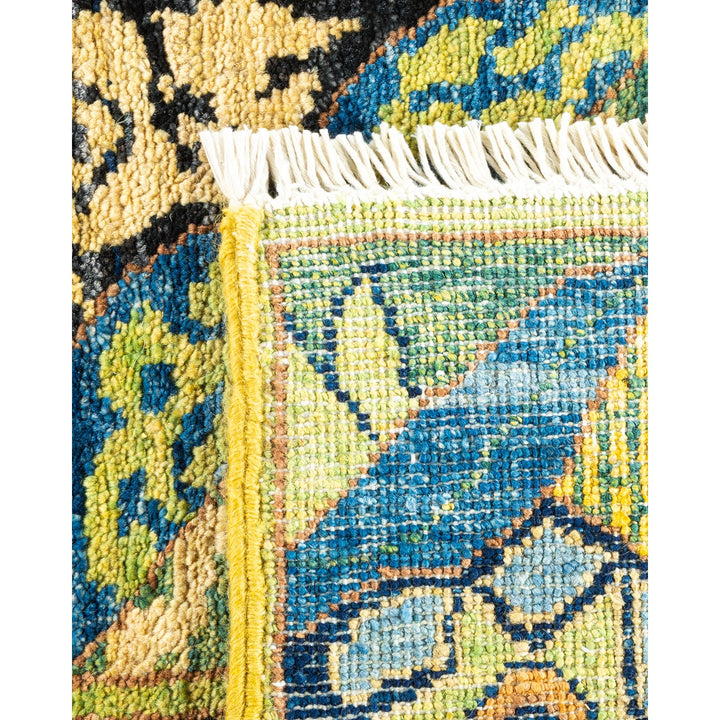 Close-up of intricately woven rug with vibrant colors and patterns.