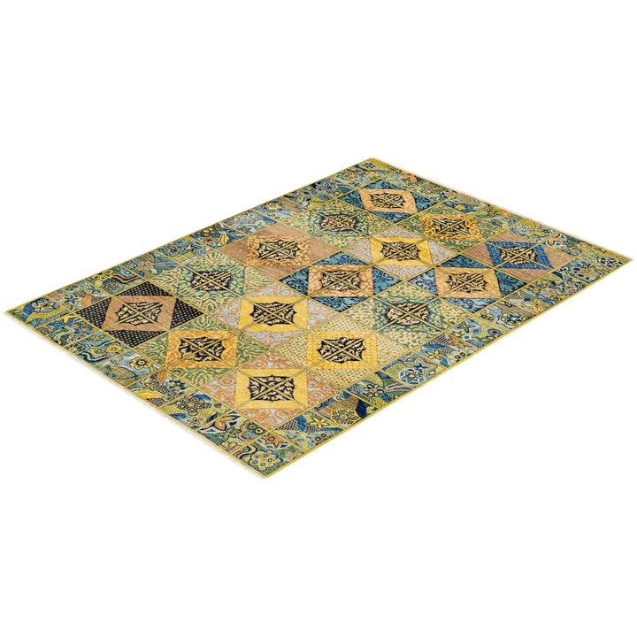 Stunning rug with geometric patchwork pattern inspired by Middle Eastern designs.