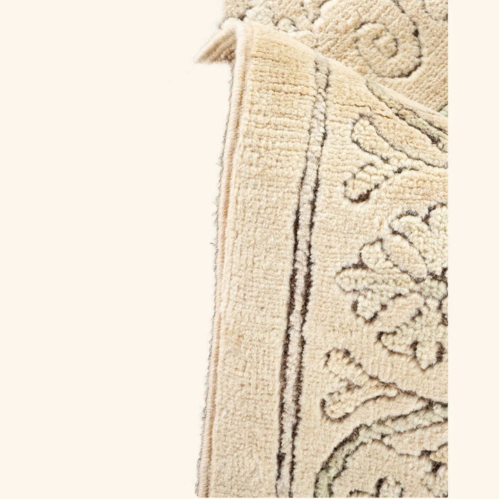 Close-up of two contrasting carpets showcasing different textures and patterns.