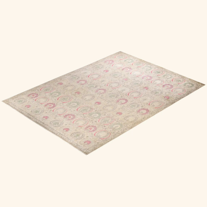 Vintage rectangular area rug with intricate concentric circle pattern.