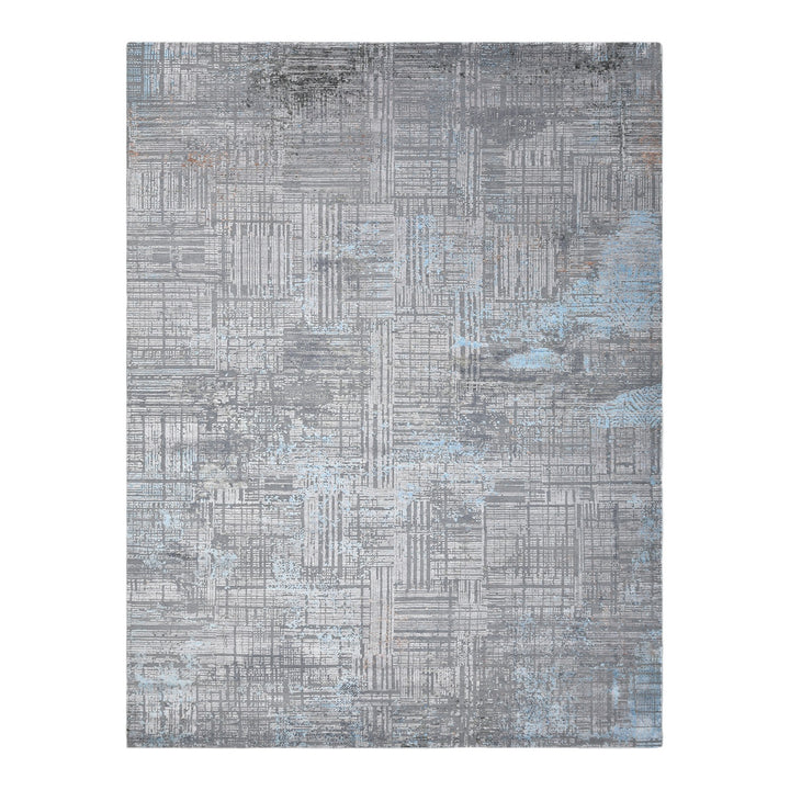 Contemporary rectangular rug with distressed grid design in gray and blue shades.