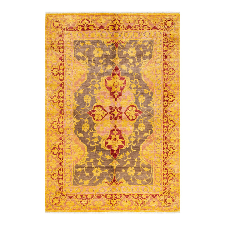 Ornate area rug with traditional design and rich red-gold palette.
