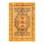 Ornate area rug with traditional design and rich red-gold palette.