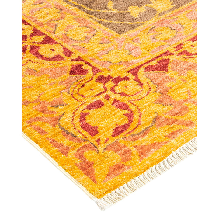 Close-up of a vibrant Persian-inspired rug with intricate patterns.