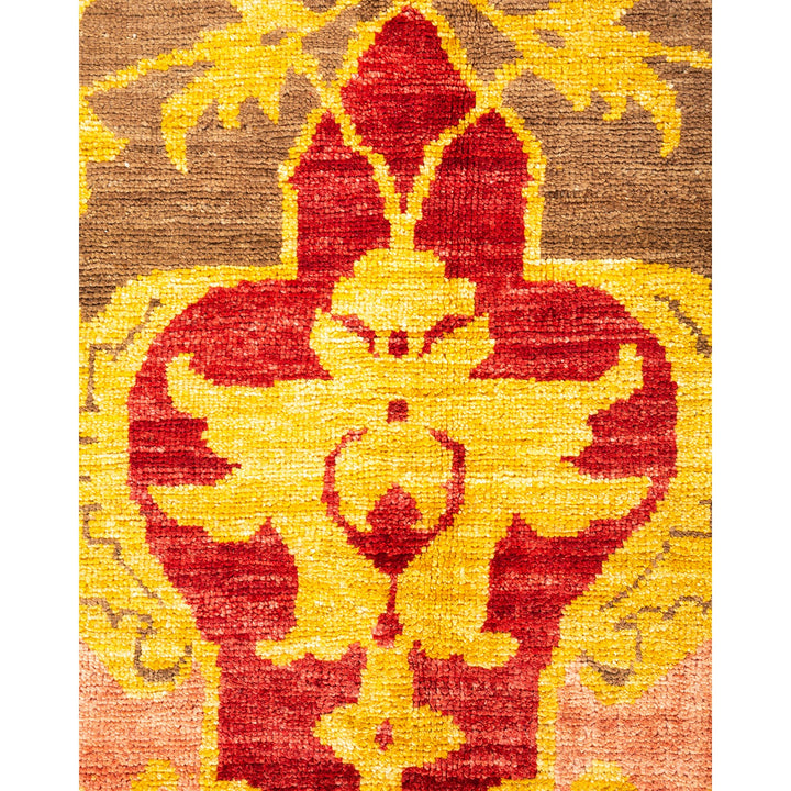 Vibrant, symmetrical textile design featuring red and yellow hues.