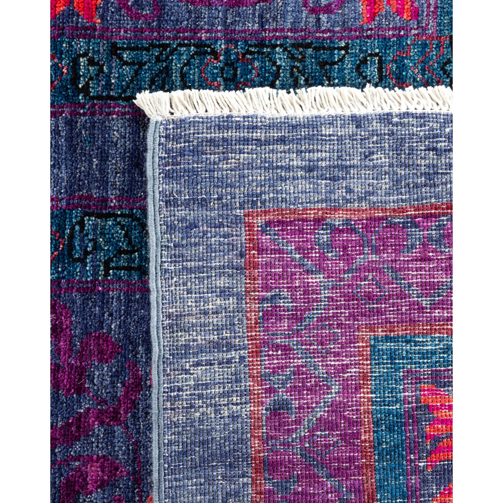 Close-up of a colorful, intricately woven textile showcasing masterful craftsmanship.