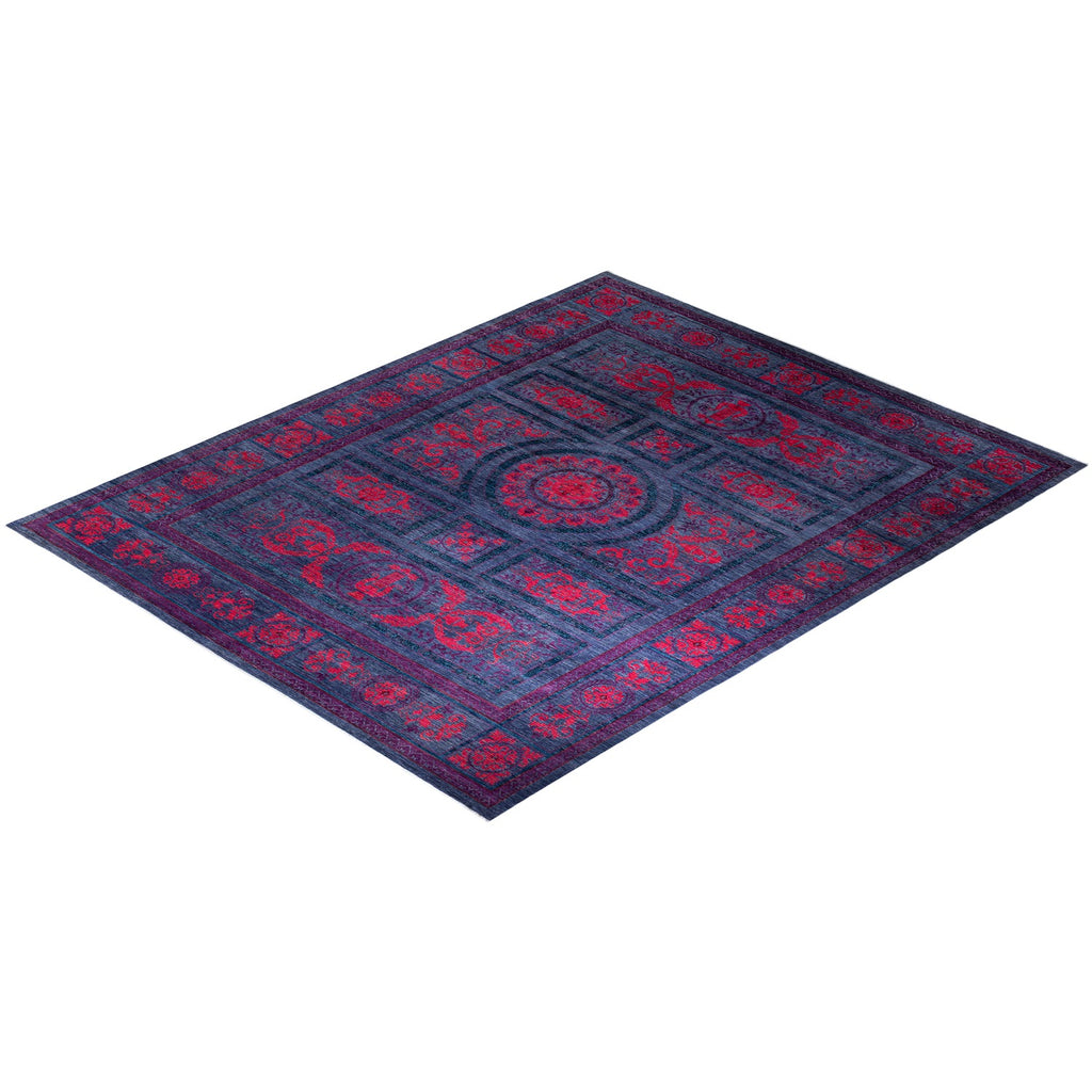 Ornate, symmetrical Persian-style rug with intricate blue and red motifs.