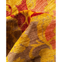 Vibrant, textured fabric in bold hues creates dynamic, abstract design.